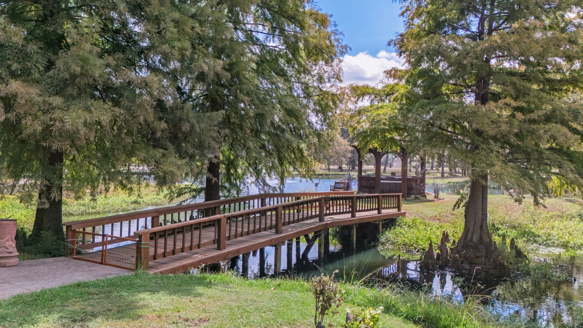 Scenic property with bridge and pond