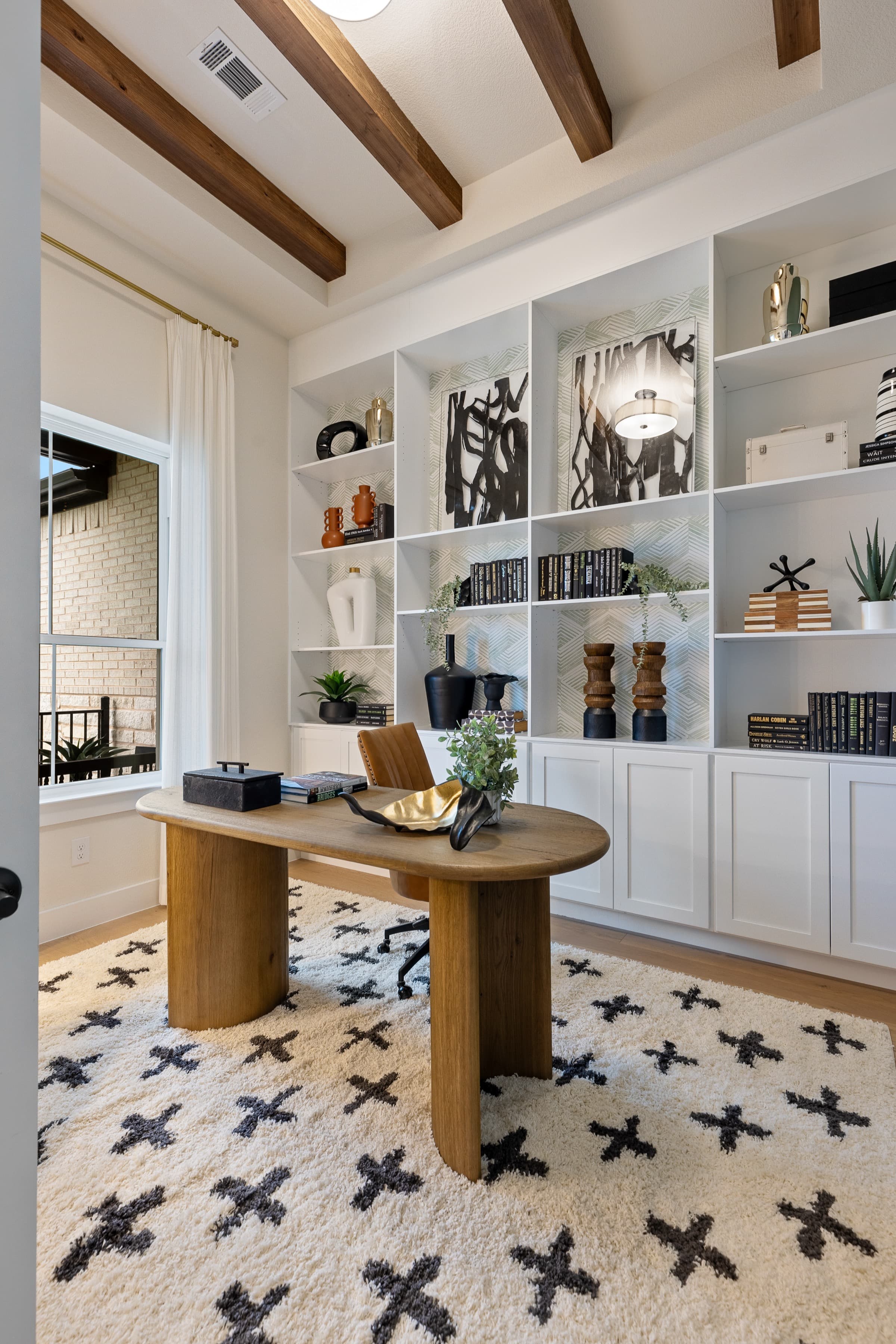 Styled home office with built-in shelving